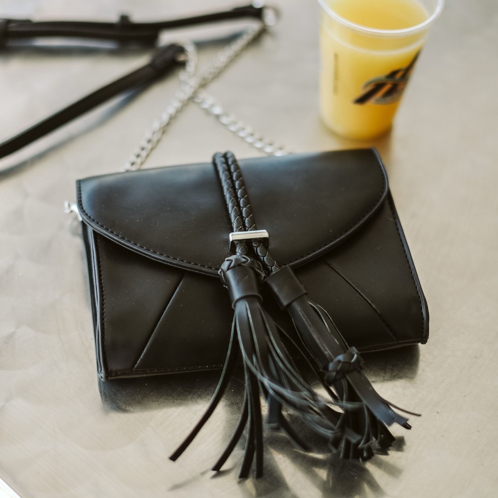 Sleek Black Tassel Crossbody Bag